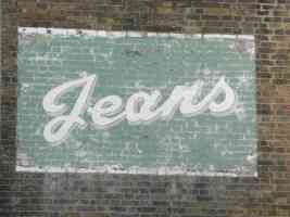 old jeans painted billboard poster