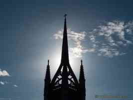 faversham church spire sunlit from behind