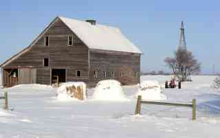 lonesome barn in the snow