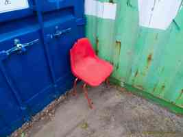 red chair blue container and green container