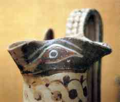 magical eye near the spout of ancient greek jug