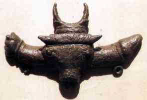 virility amulet with crescent horned bulls head and male sexual organ
