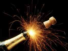 sparkling champagne popping cork