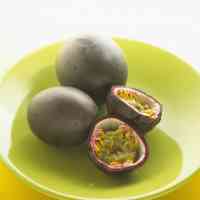 whole and halved passion fruit