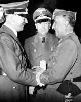general franco of spain and adolf hitler shake hands  on the french spanish border in 1940