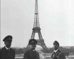 posing with officers in front of eiffel tower
