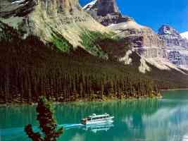 canadian rockies maligne lake with tour boat