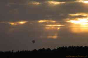 hot air balloon and sunrays