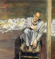 red haired man on chair