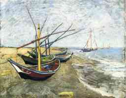 fishing boats on the beach at les saintes maries de la mer