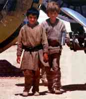 kister banai and anakin skywalker getting ready for the podrace