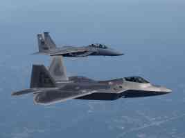 FA22 and F15 flying together