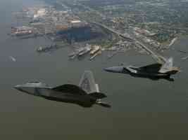 FA22 and F15 over the city