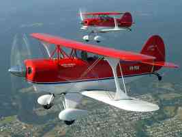 two red biplanes