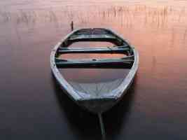 rowboat on still lake