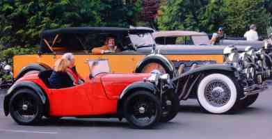 1931 Duesenberg Model J Tourster Yellow Black and 1937 Austin Seven Nippy Roadster Red fvr