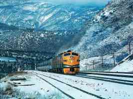train in snowy mountains