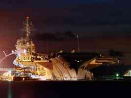 aircraft carrier at night