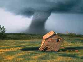 tornado destroying barn