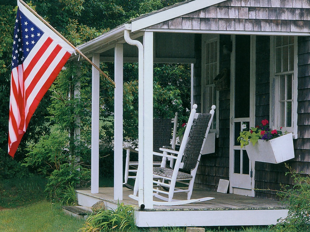american flag on the porch